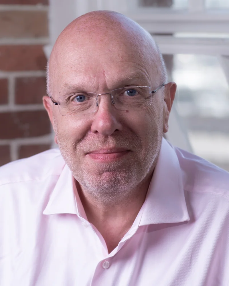 Headshot of John Bartlett, CTO of BCi Digital