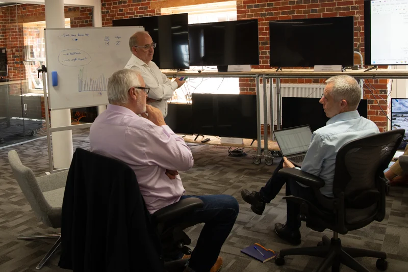 BCi team members in a consultation meeting