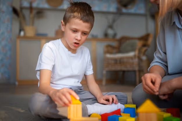 Mother playing with her autistic son using toys