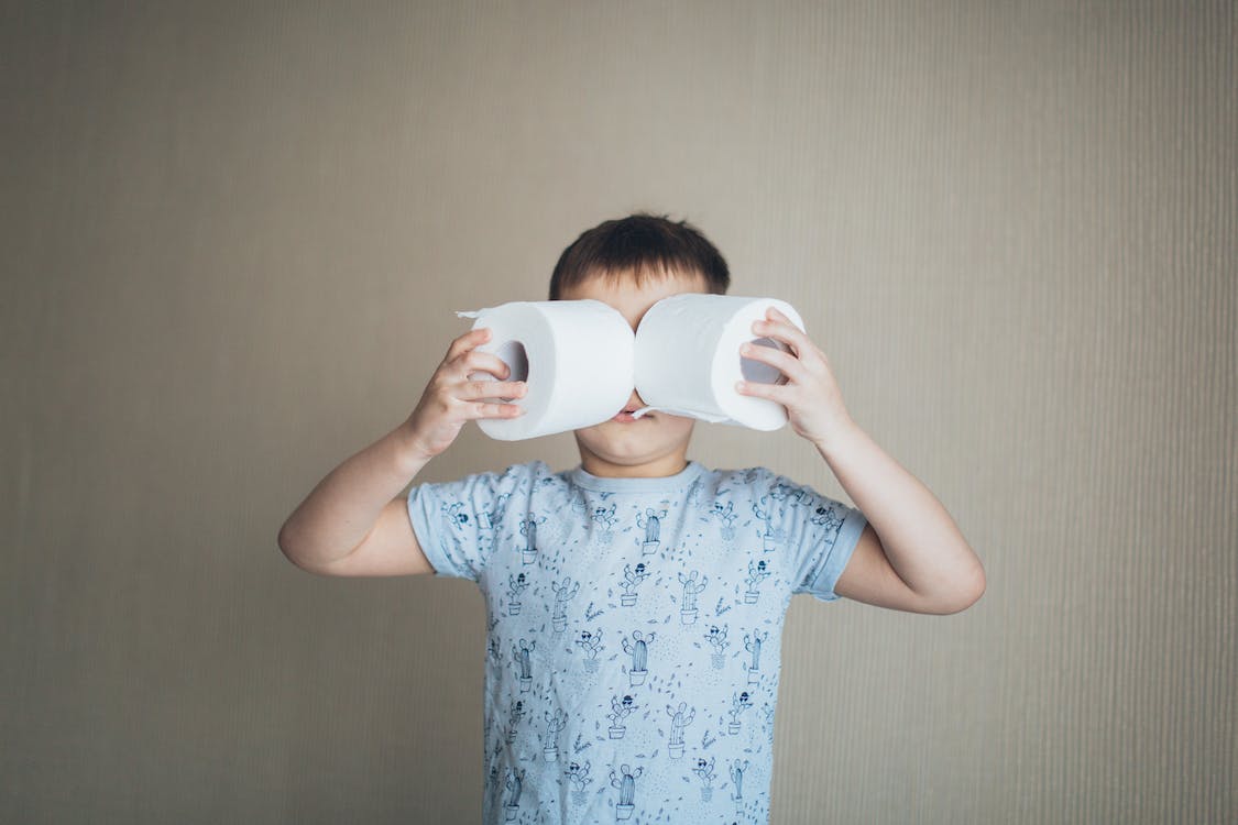 Free Little Boy Holding Tissue Roll Stock Photo