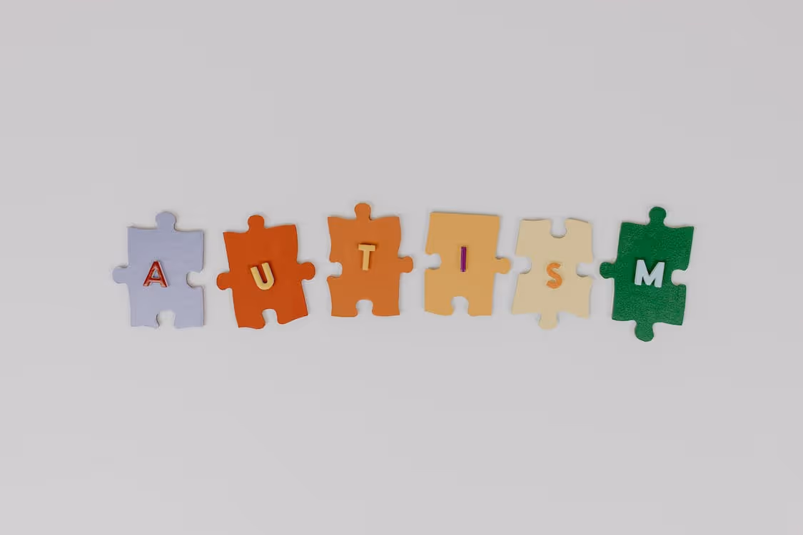 Free Orange Green and Yellow Puzzle Pieces Stock Photo