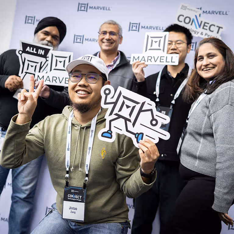 Group at Marvell event posing for camera