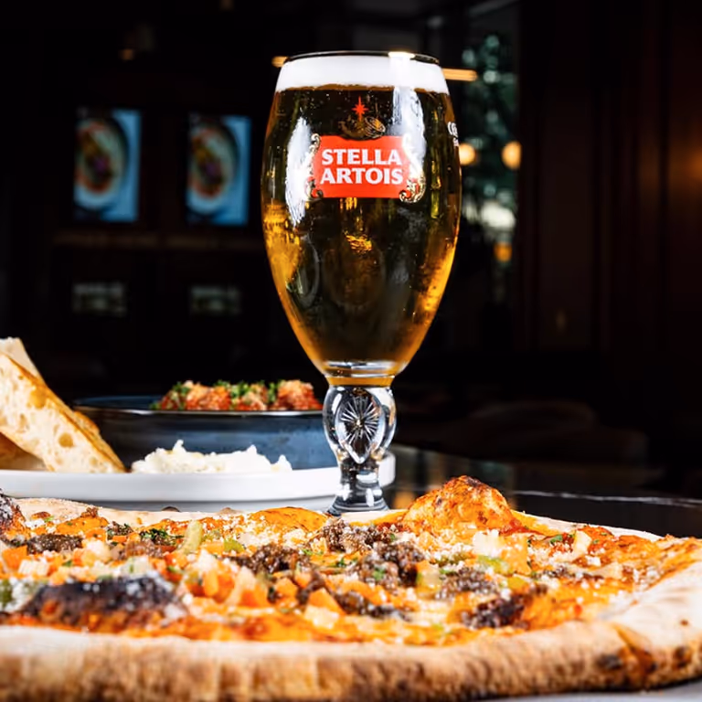 Pizza and beer in photo