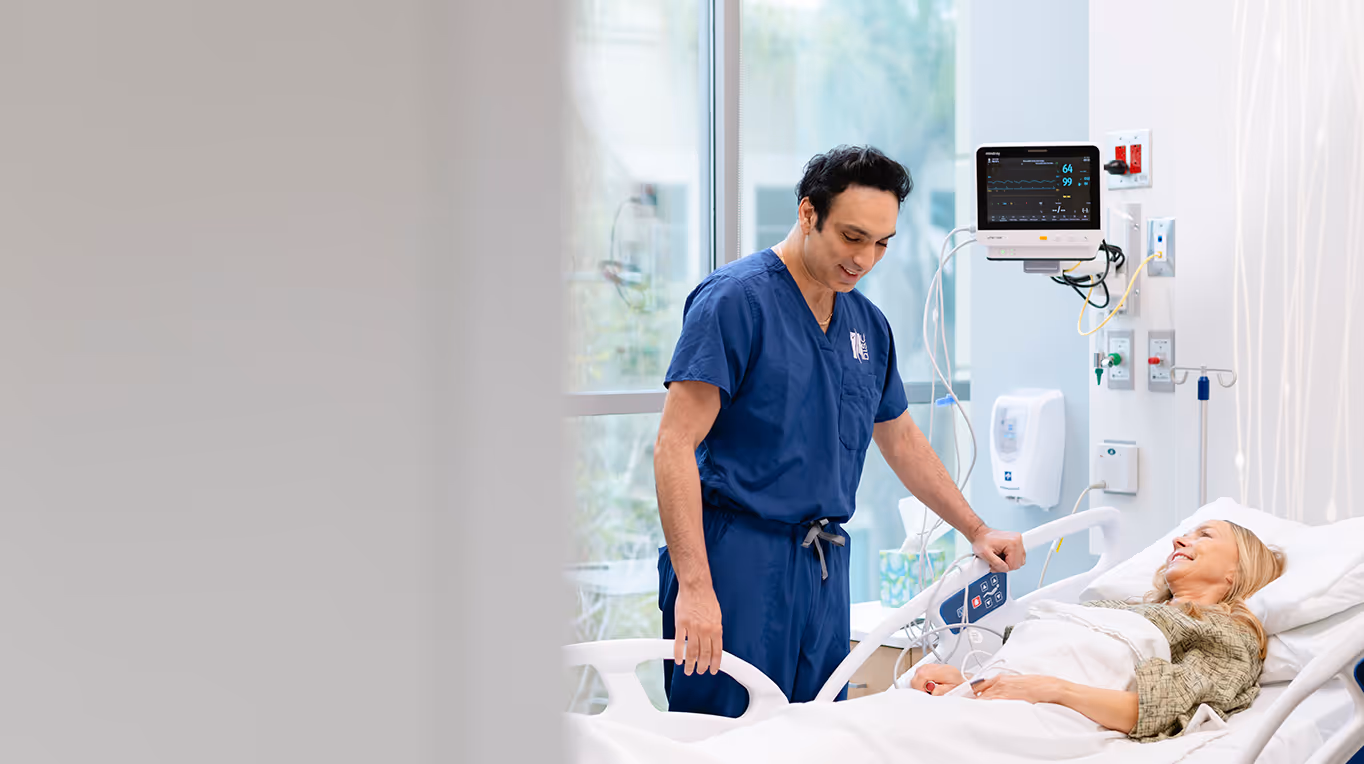 Dr. Jeswani at DISC checks in on a patient.