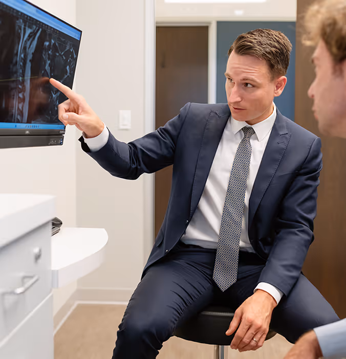 Doctor reviewing scans with a patient.