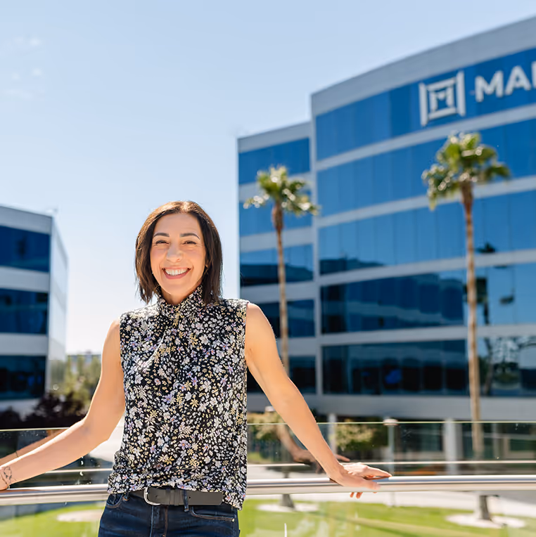 Marvell employee posing in front of the headquarters in Santa Clara, CA
