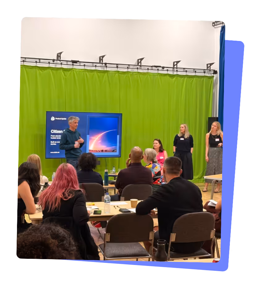 A man giving a presentation in a room