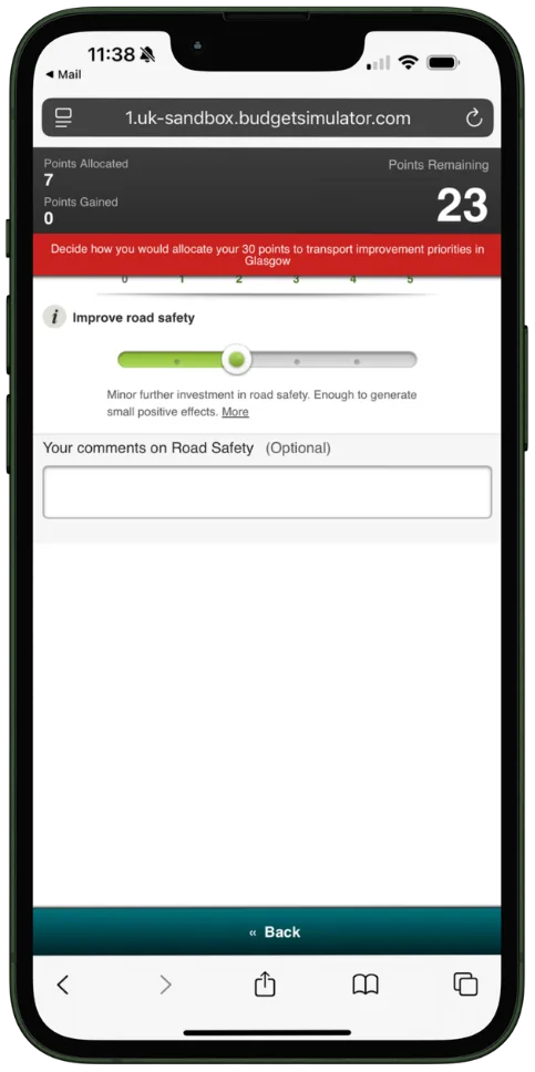 Mobile phone screen displaying a budget simulator website asking to allocate 30 points for transport improvements in Glasgow, with 7 points allocated and 23 points remaining, showing a slider set to improve road safety with explanatory text and an optional comment box.