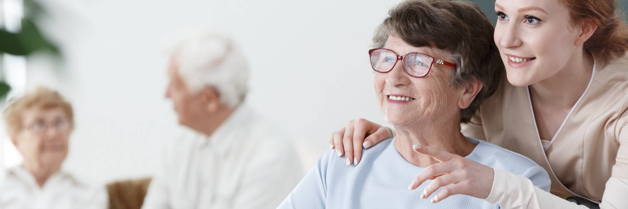 A care worker and aged care person