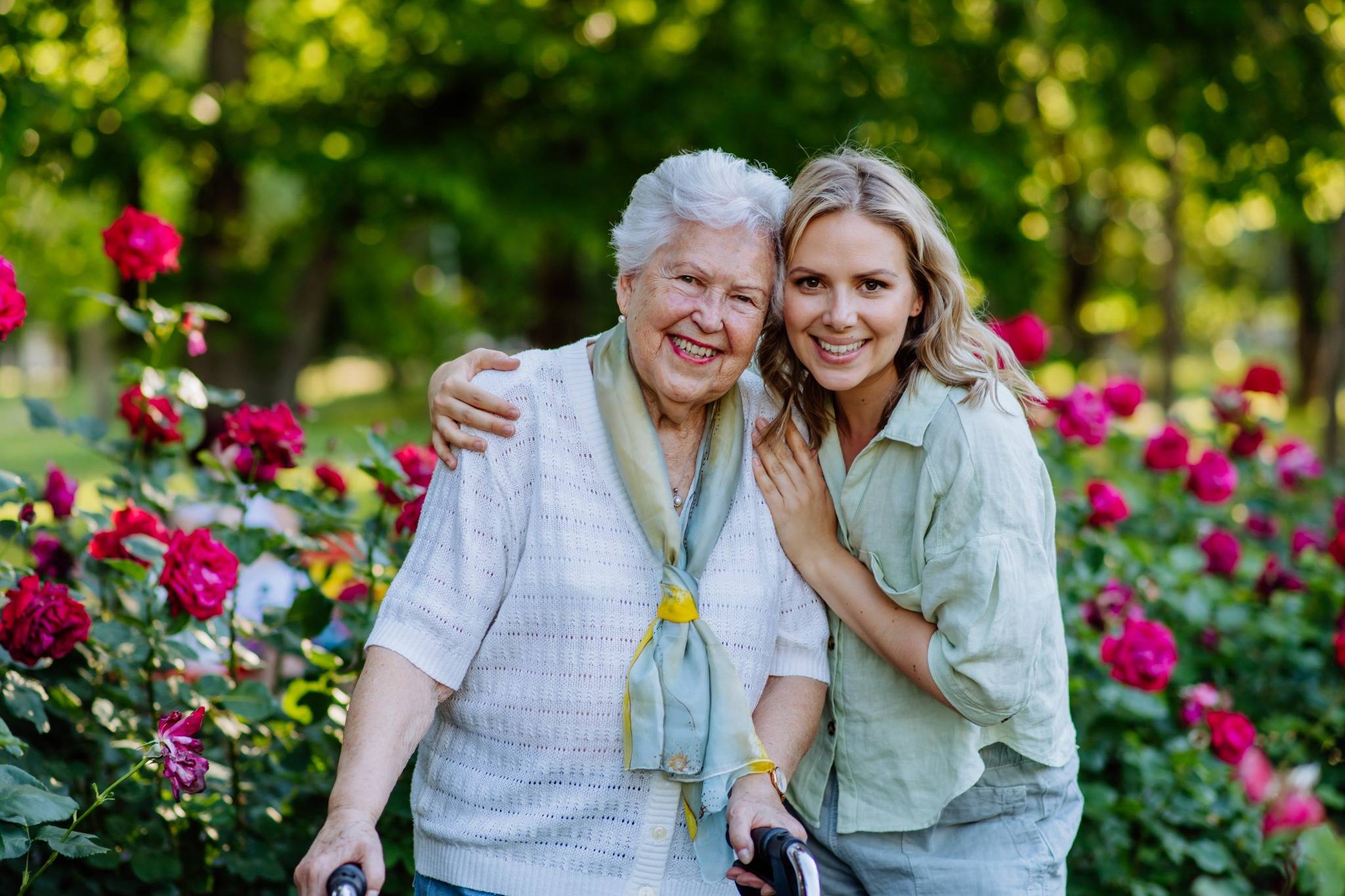 A care worker and aged care client in community