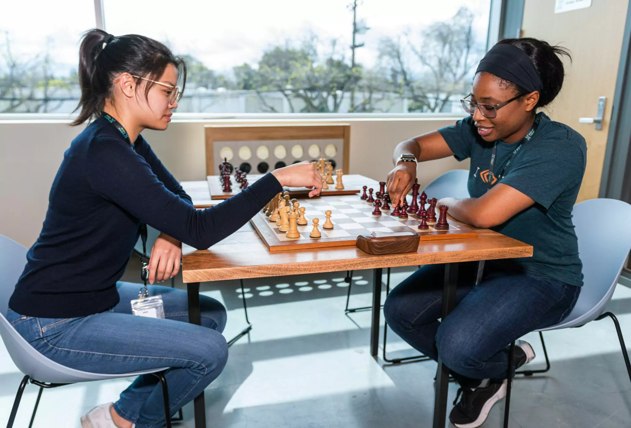 Two women playing chess