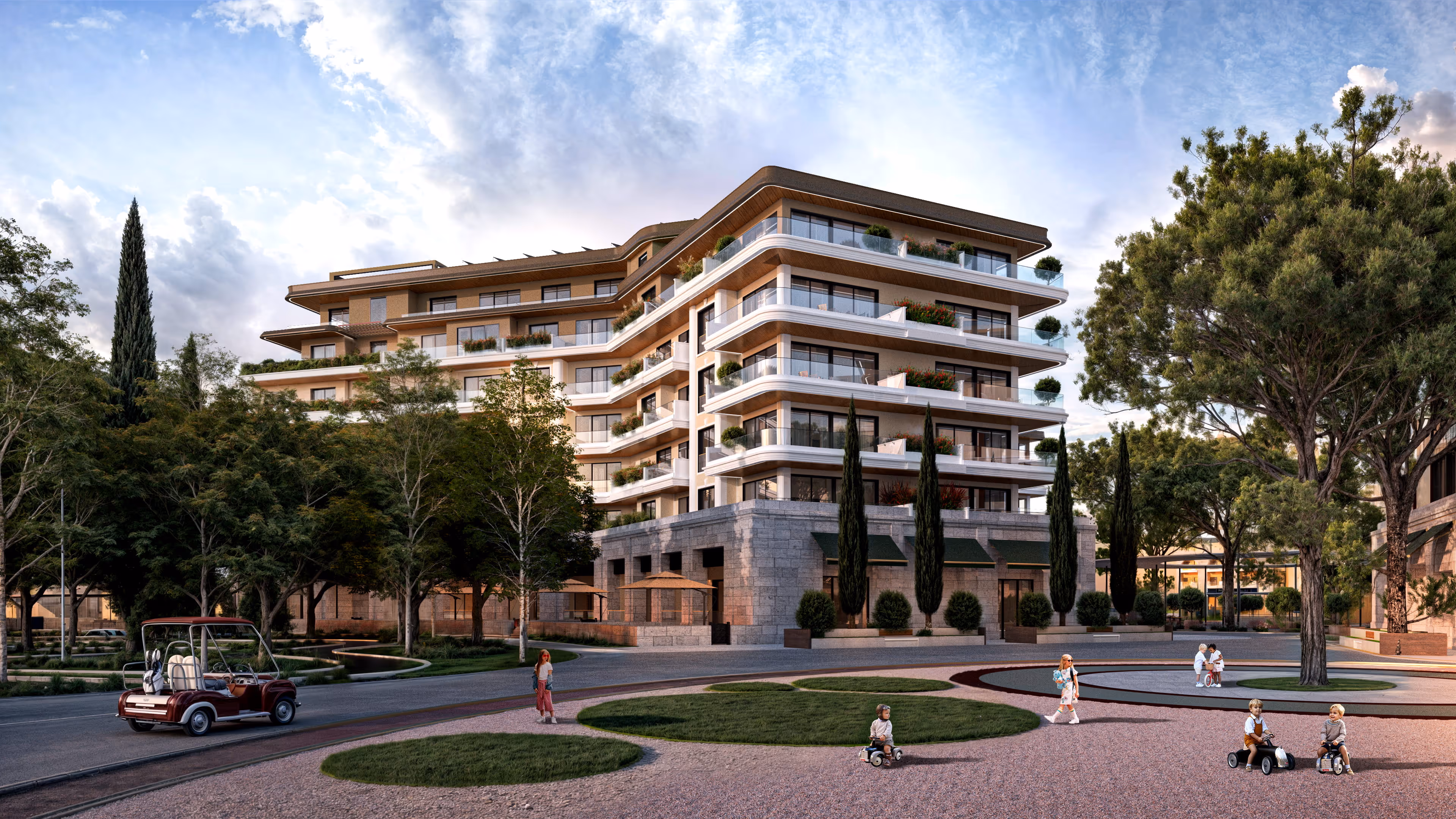 Courtyard of Porta Rai residences with families, children playing, and landscaped greenery.