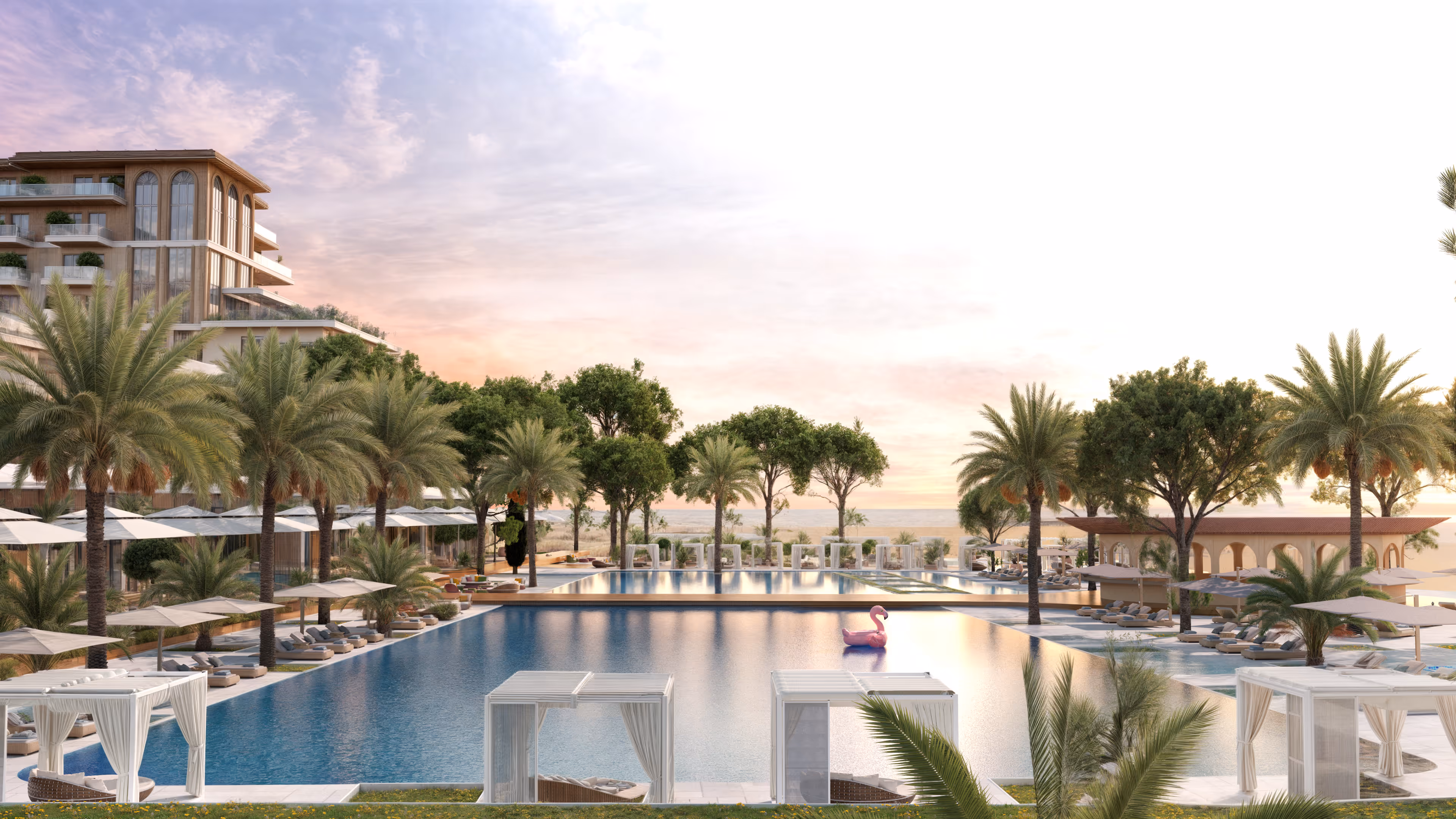 Luxury swimming pool at Porta Rai with cabanas, palm trees, and sunset ambiance.