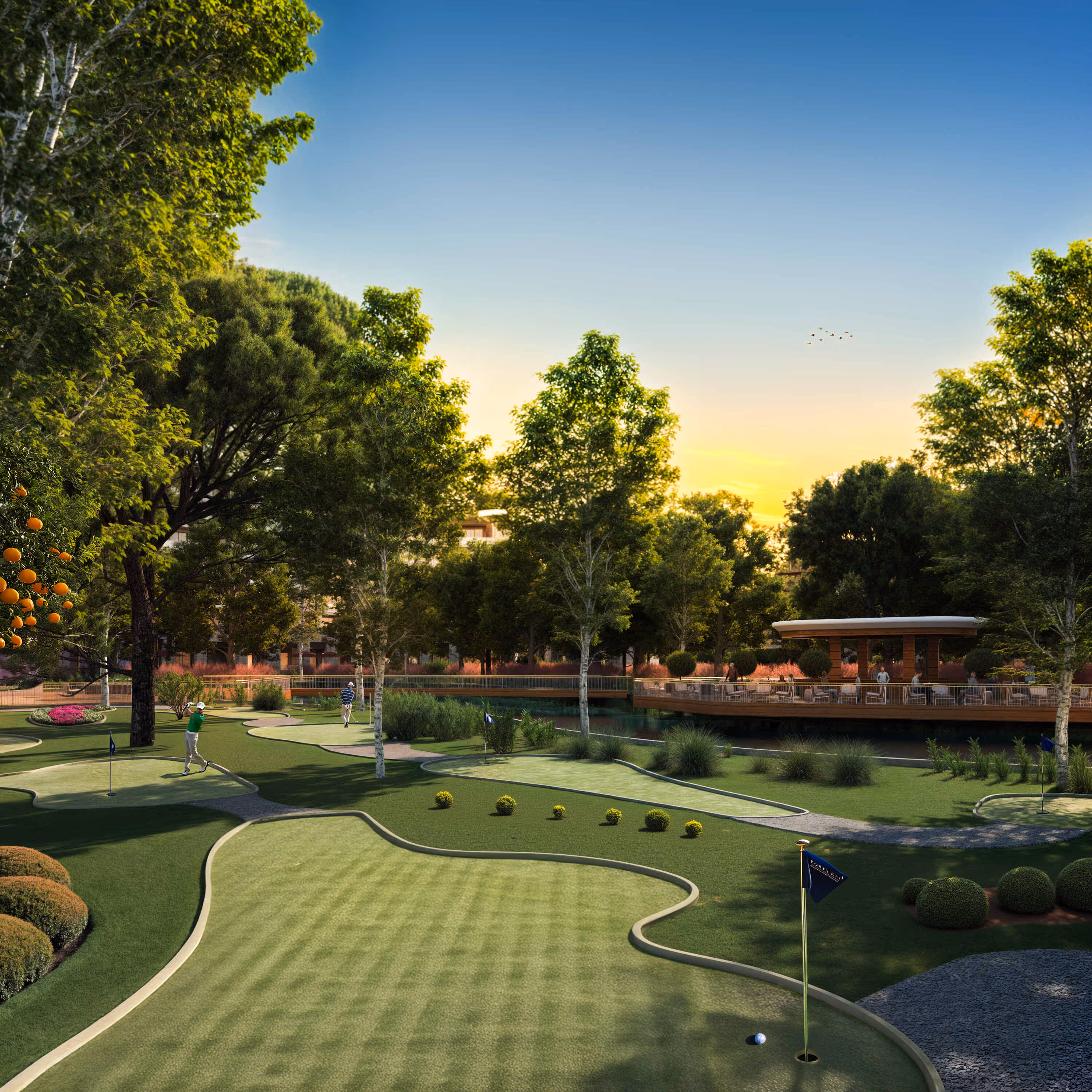 Scenic mini golf area at Porta Rai surrounded by greenery, trees, and a relaxed sunset atmosphere.