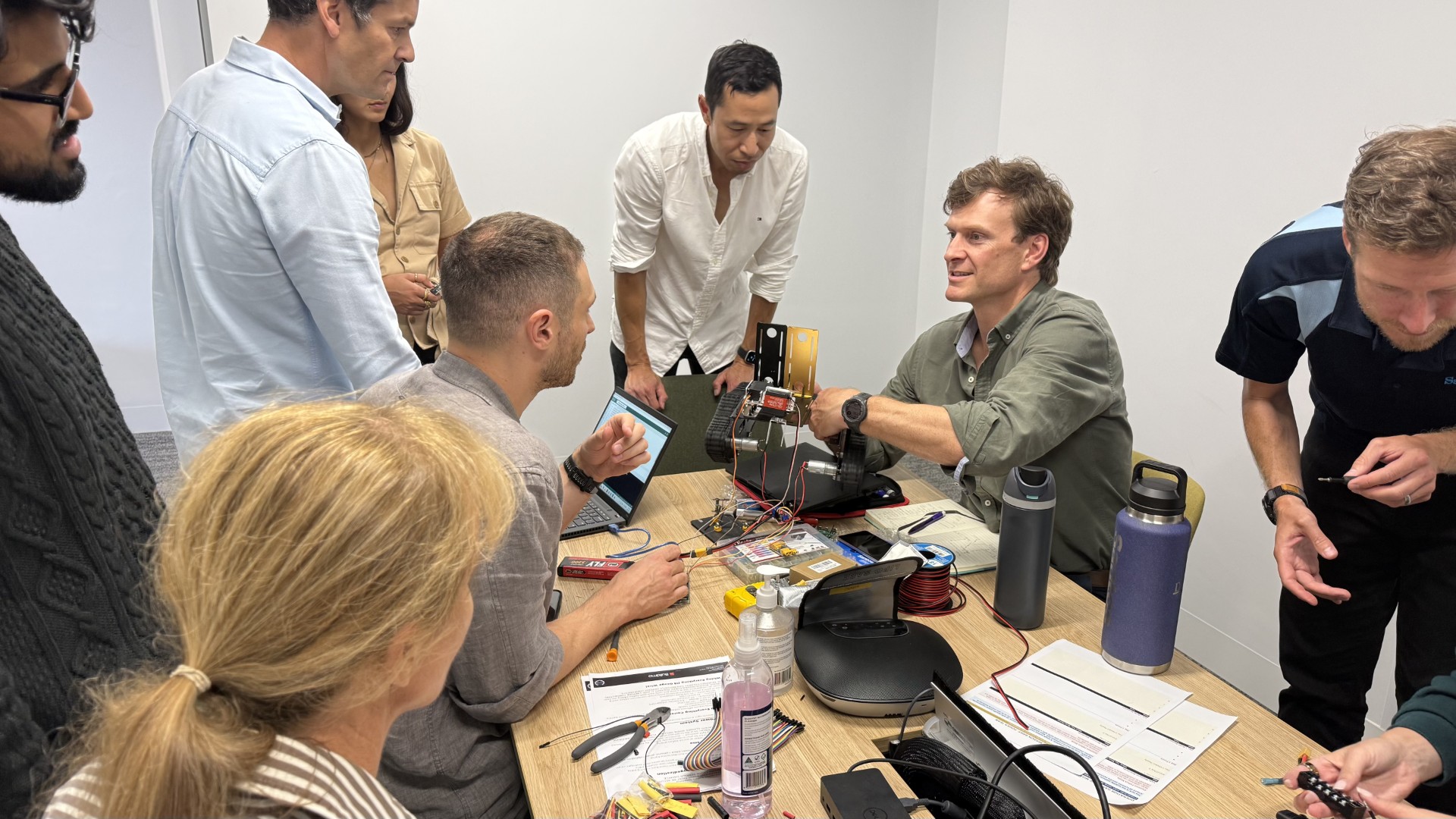 11point2 team building a robot during BuildMo training engagement in Adelaide