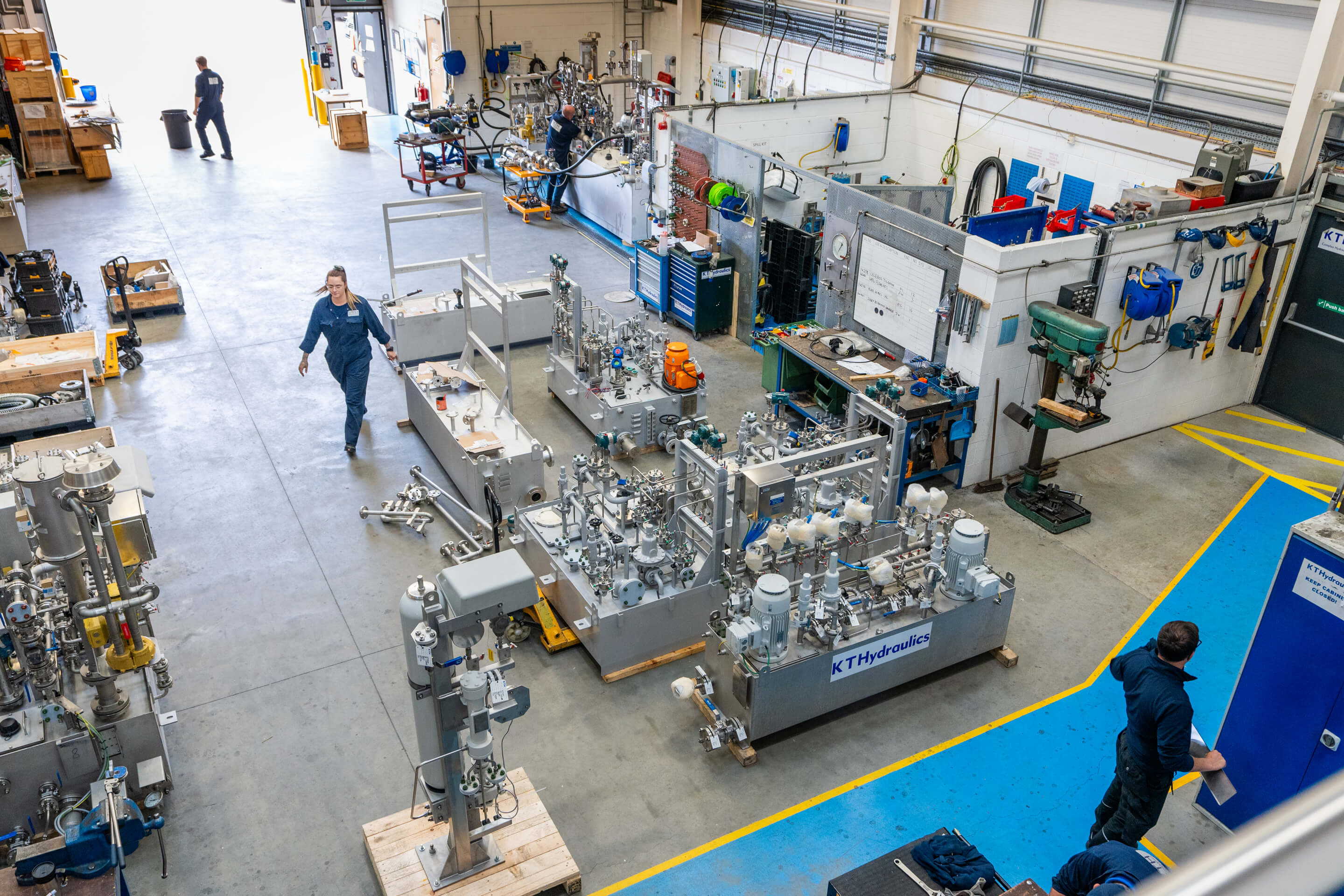 A wide shot of the shop floor at the KT Hydraulics factory floor