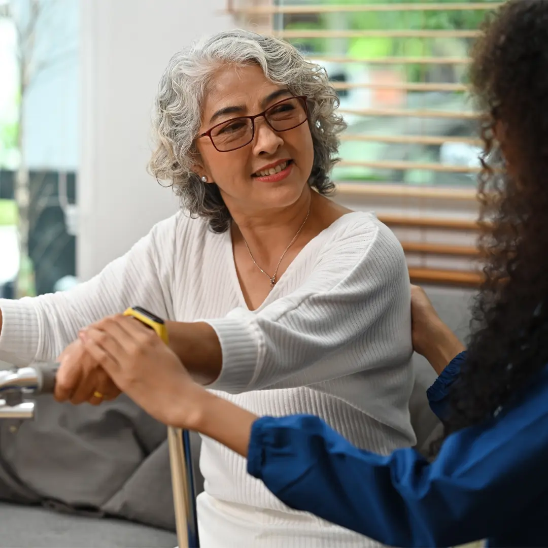 Occupational therapist helping client