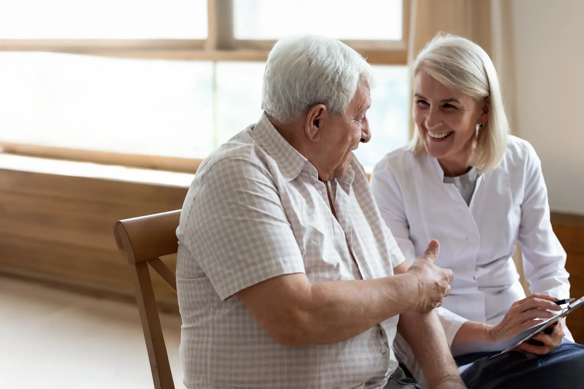 Occupational therapist helping client