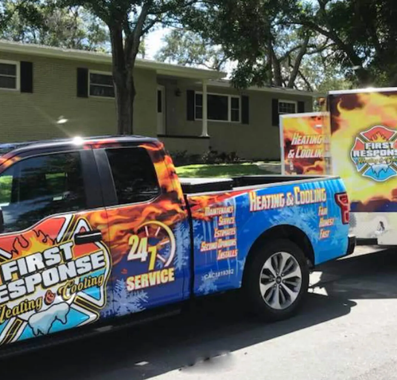 First Response Heating and Cooling truck with 24/7 service parked outside house