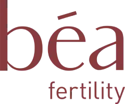 Partial view of text reading 'béa fertility' in red font on a white background.