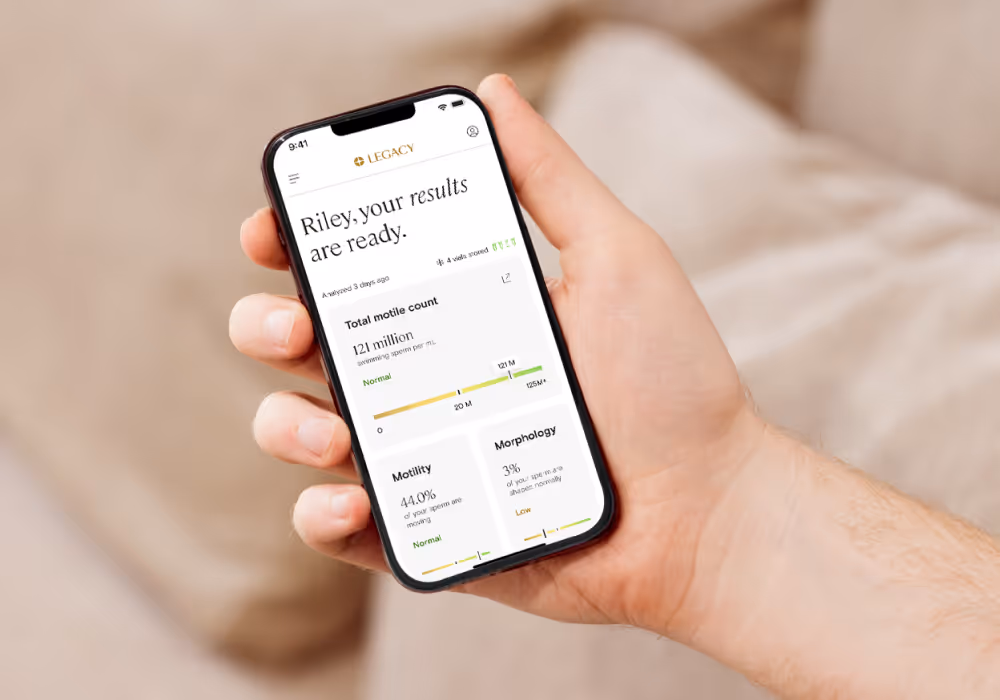 Trans woman smiling while opening a Legacy collection kit