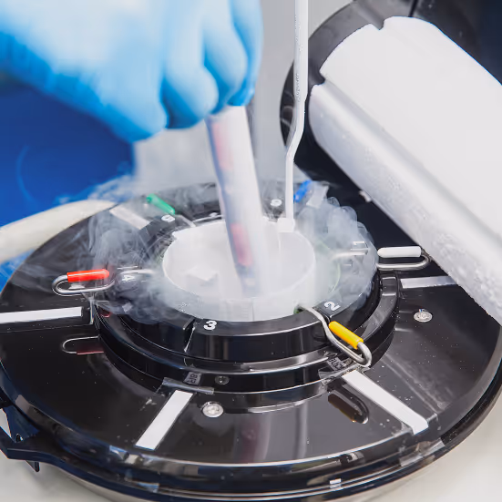 Trans woman smiling while opening a Legacy collection kit