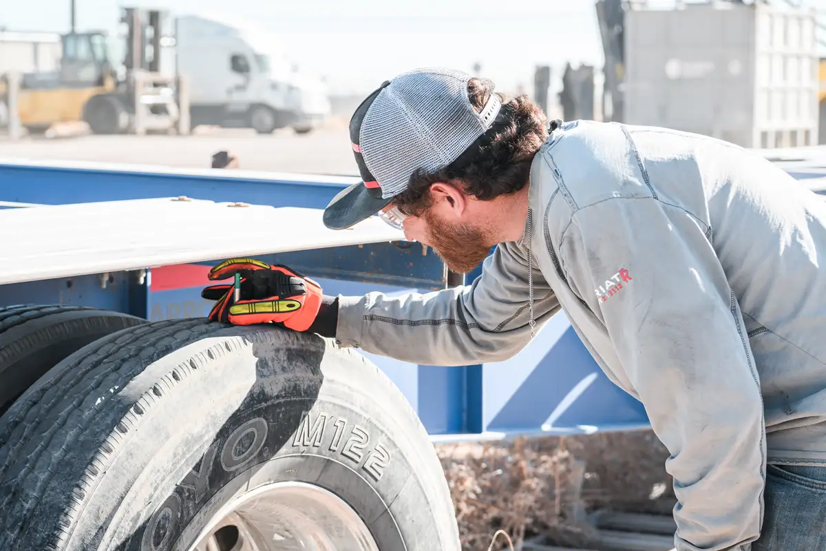 Diesel mechanic performing DOT Inspection in Dubuque, IA
