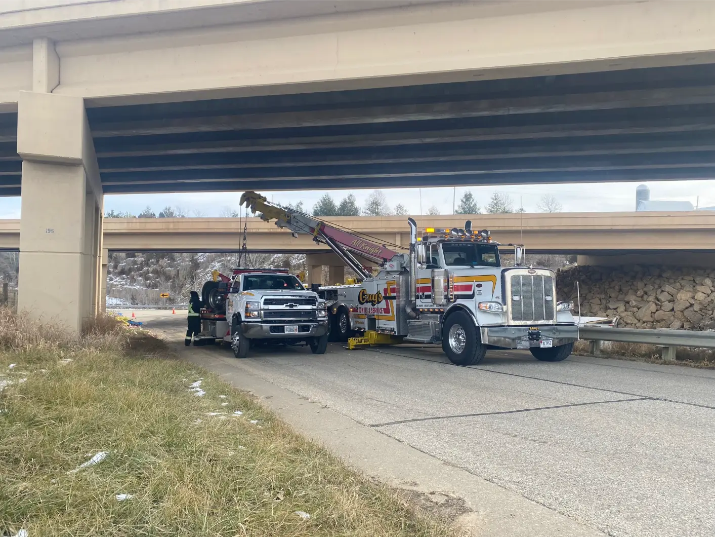 Diesel mechanic performing Roadside Assistance in Dubuque, IA