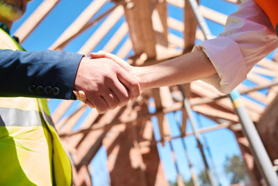 image of contractor and client handshake