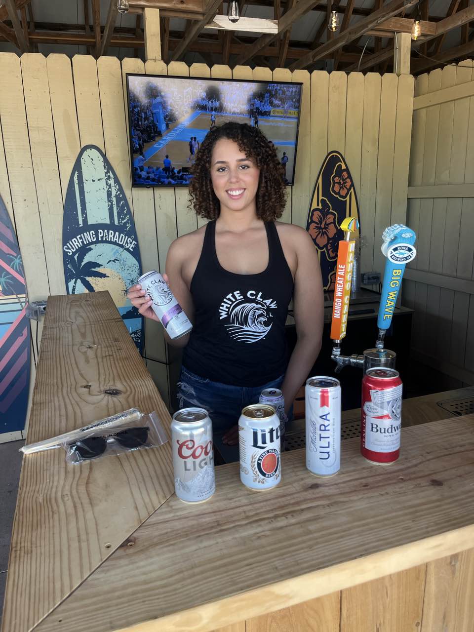 Brand ambassador team engaging with consumers at a product sampling event