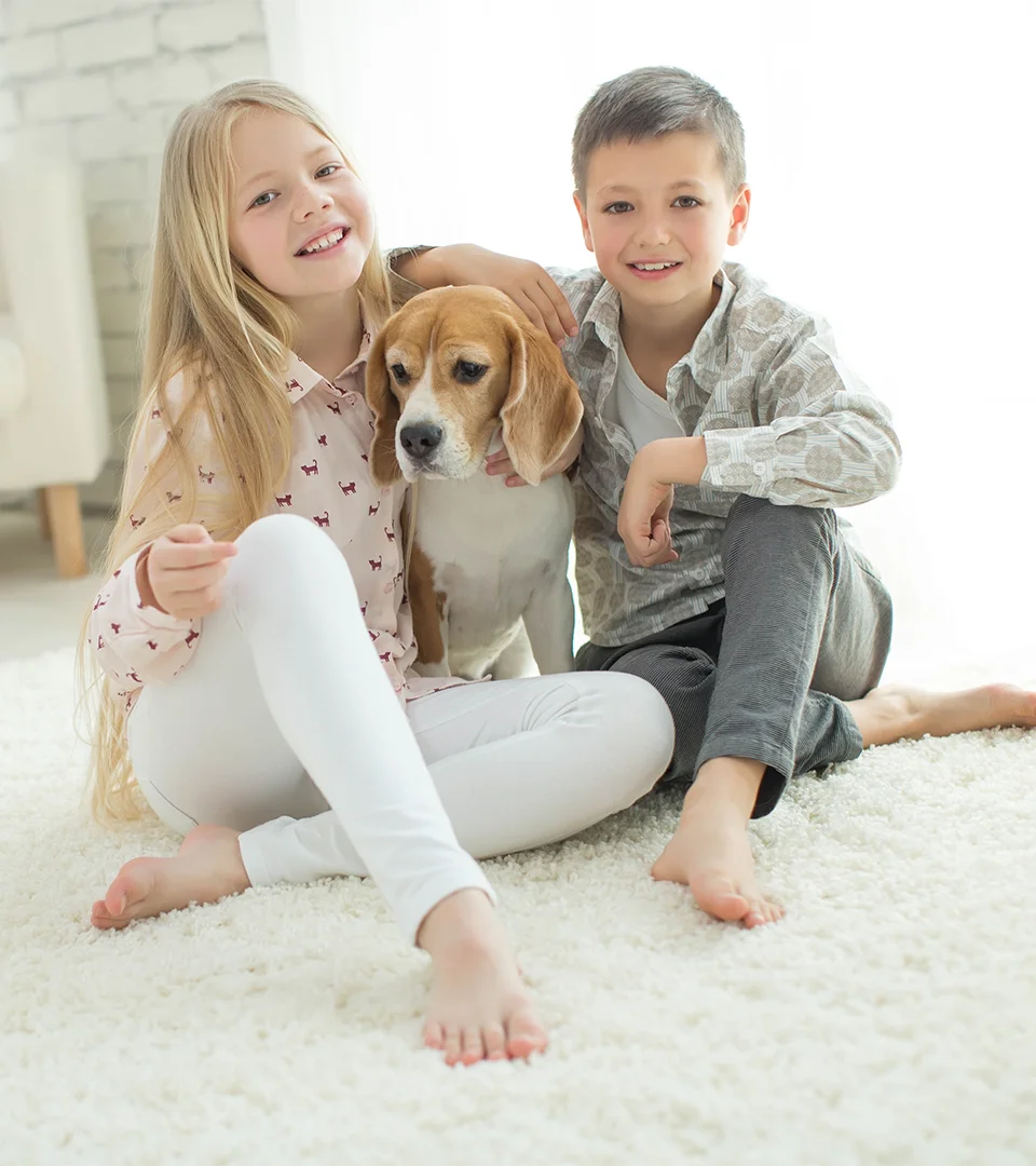 Happy Kids and Dog on Freshly Cleaned Carpet