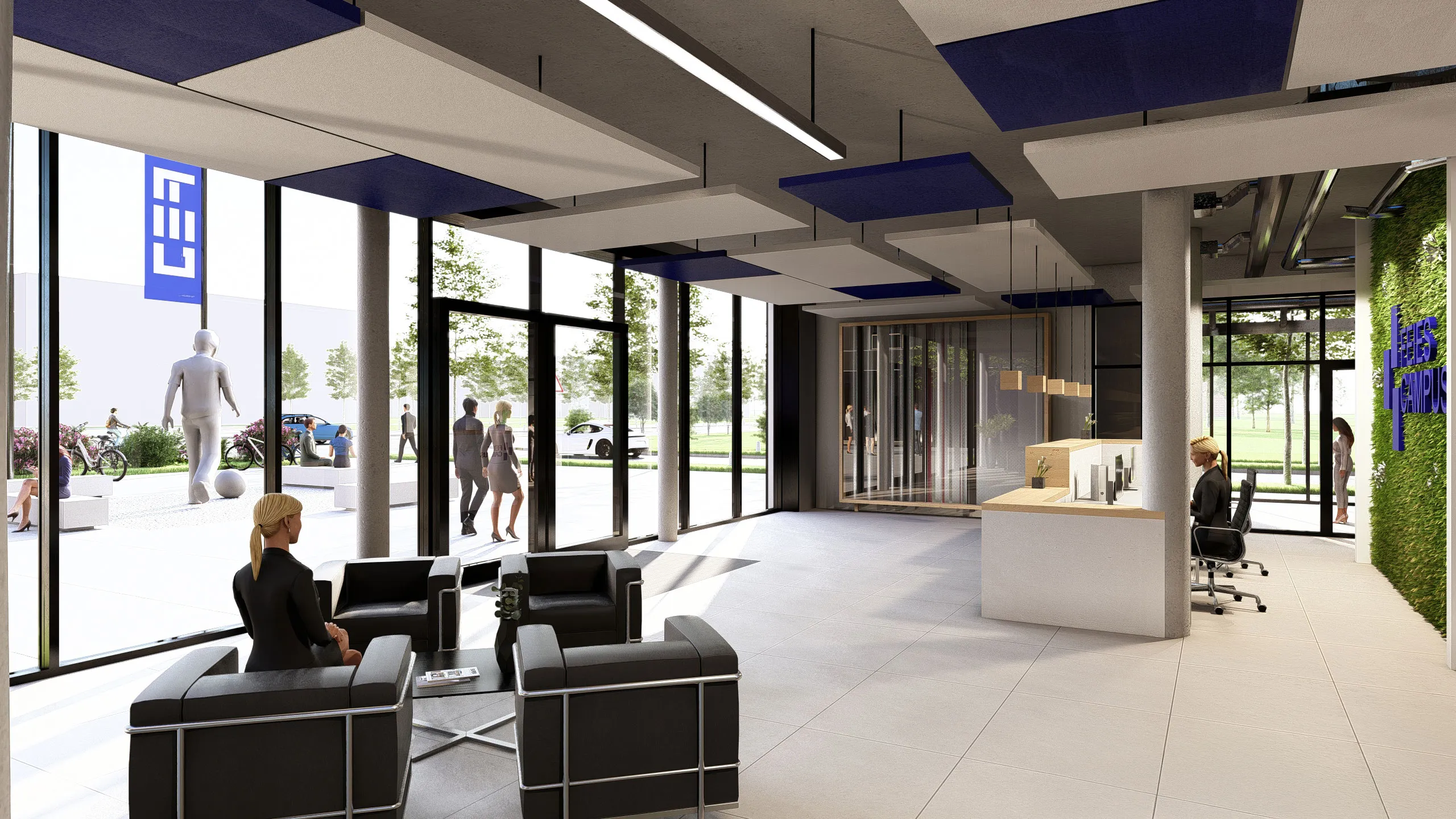 Lobby des Feies Campus mit Empfang, Lounge-Sitzgruppe und großen Fensterfronten.