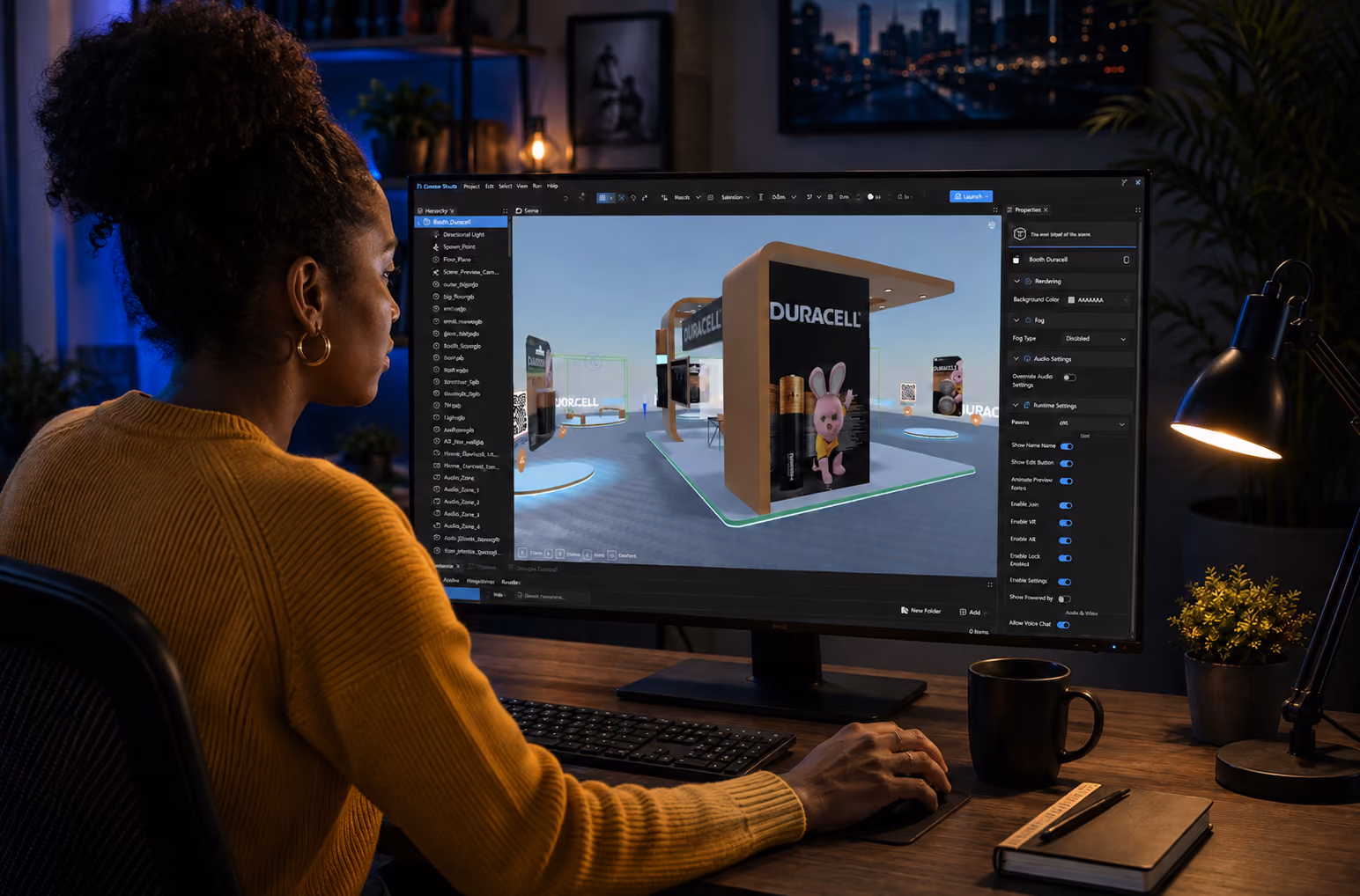 Next Reality Digital metaverse development, showing a designer using XR Creator Studio to build an immersive Duracell branded virtual booth with interactive product displays and VR and AR features.