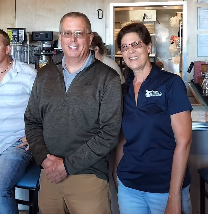 image of team members analyzing garment care strategies