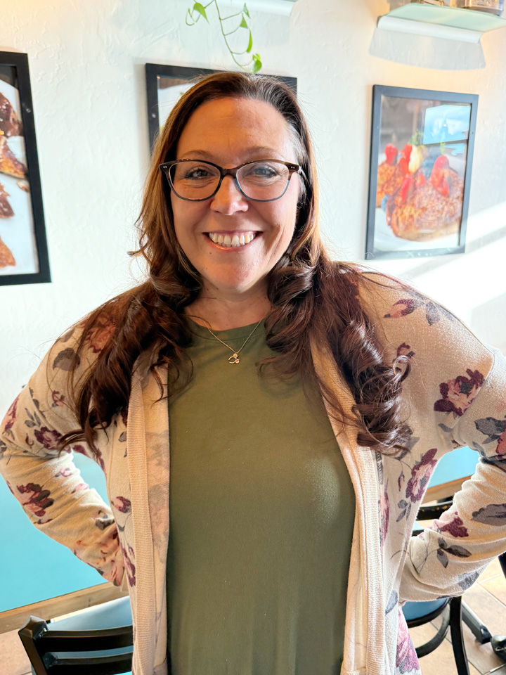 [background image] image of stage with seating for author & writer