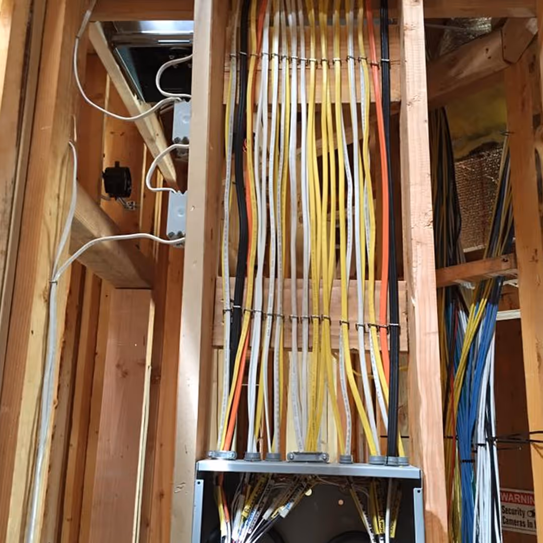 Professional electrical wiring installation for luxury smart home lighting and power systems by Totally Wired Electric in Southern California.
