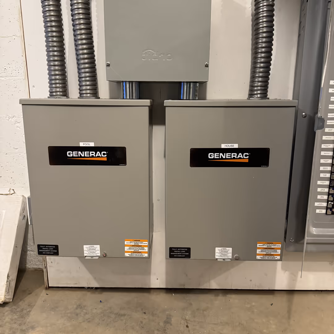 Generac automatic transfer switches installed by Totally Wired Electric for seamless backup power management in a luxury Southern California home.