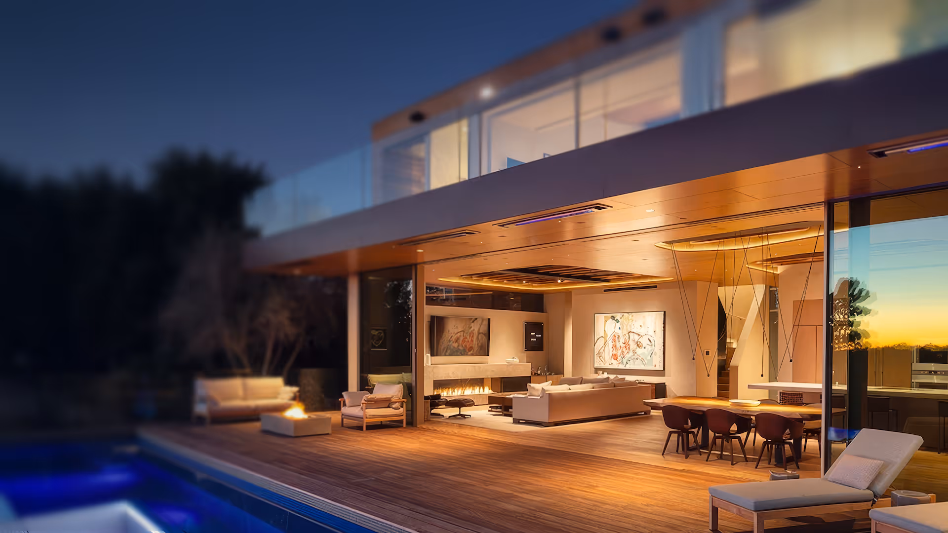 Modern Southern California luxury home with custom outdoor lighting, smart home automation, and entertainment systems installed by Totally Wired Electric.