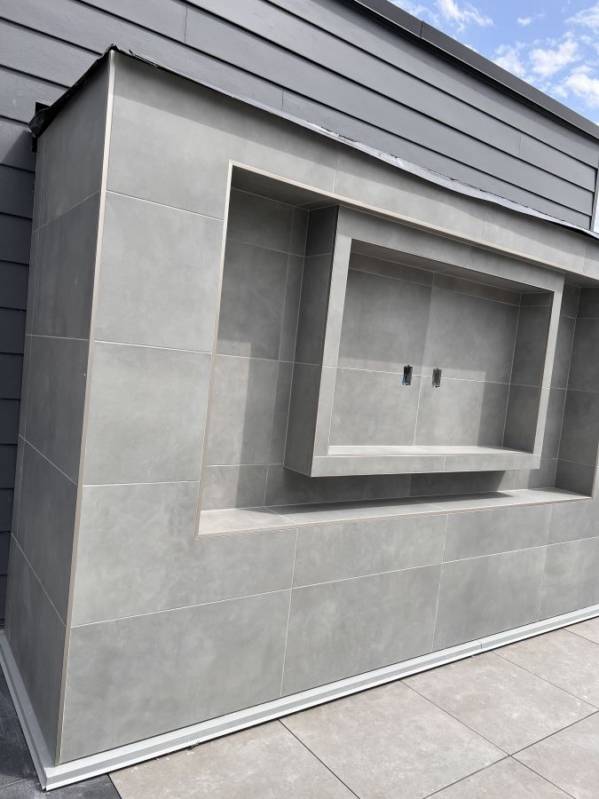 the outdoor tv wall at a zoomed out angle