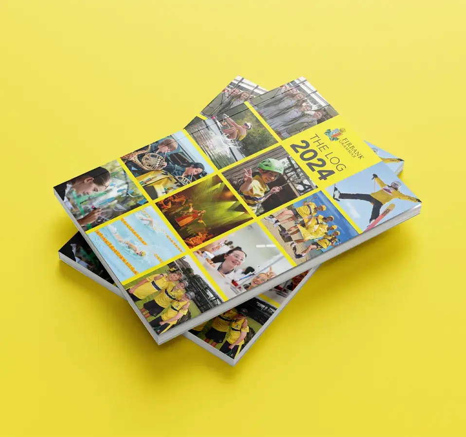 Firbank Grammar School 2024 Log yearbook covers stacked on a yellow background, featuring collage of student activities.