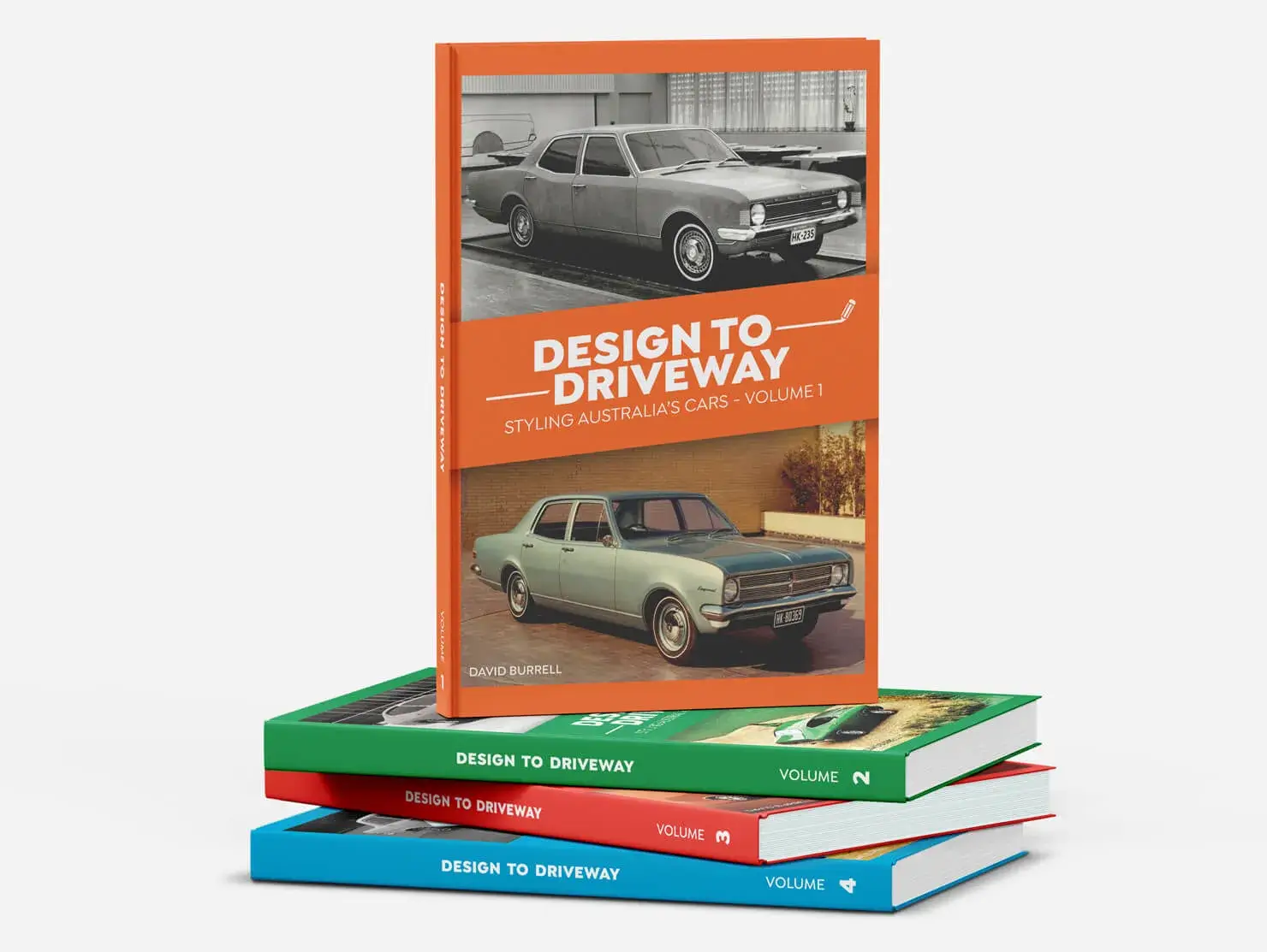 Design to Driveway Volume 1 standing upright on a stack of Volumes 2–4, highlighting the complete collection of books celebrating Australian automotive design.