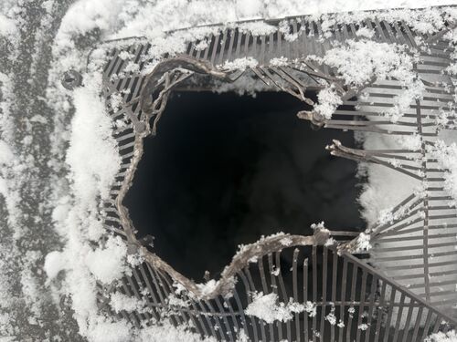 Roof vent ripped open by raccoon