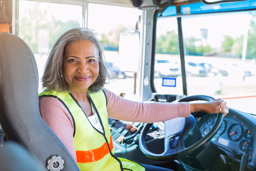 A women driving a bus
