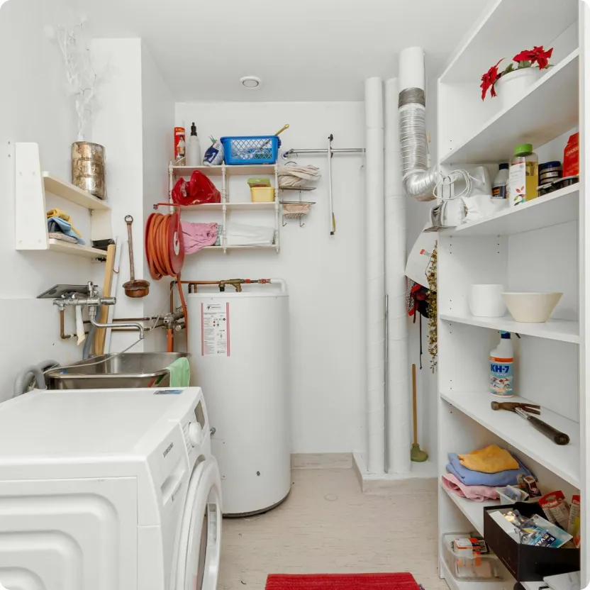 Image of a clean white laundry room renovation