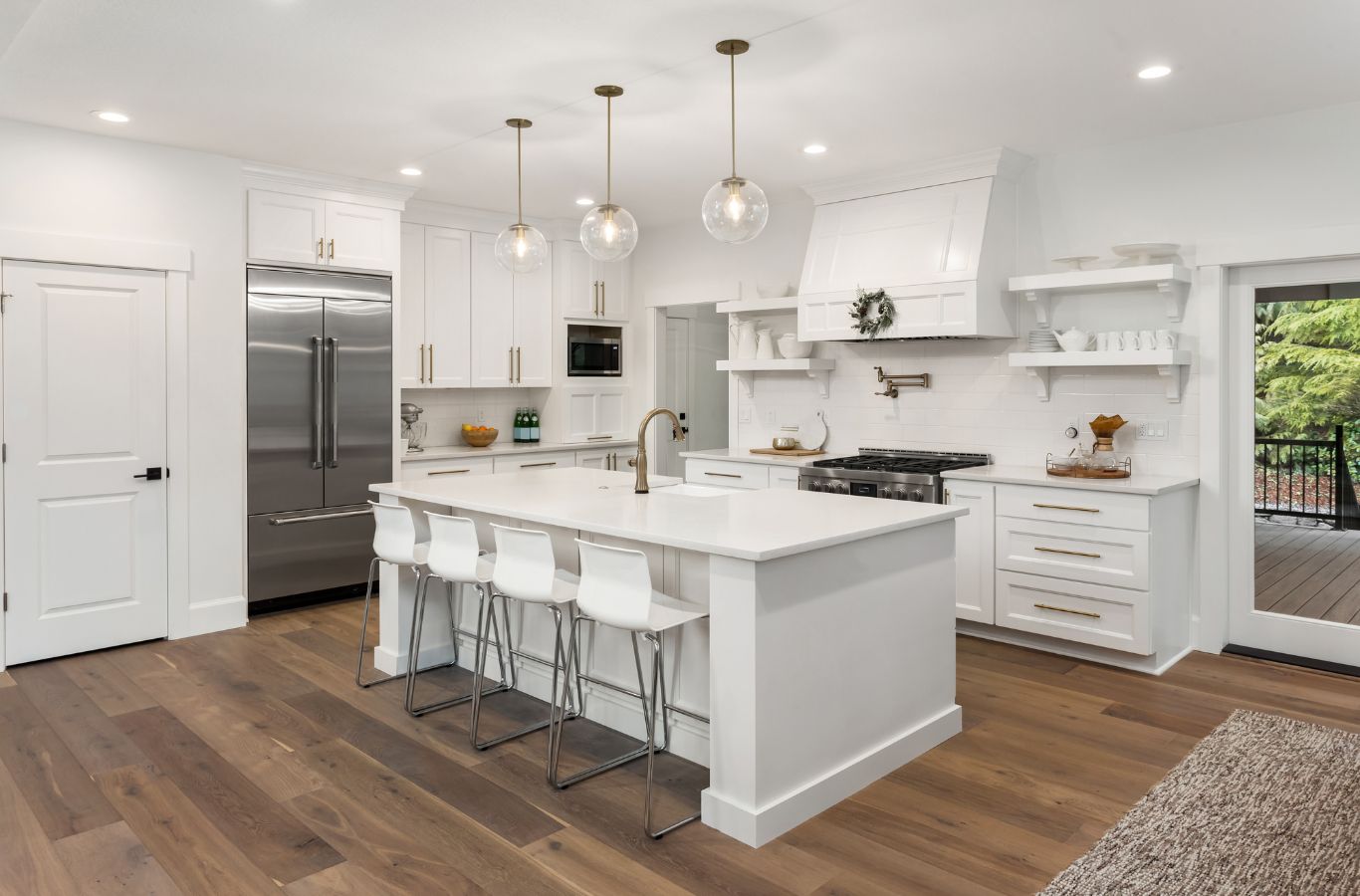 A PMB Property Improvements team member showcasing kitchen remodeling benefits with beautiful cabinetry and updated designs in St. Pete Beach, FL.