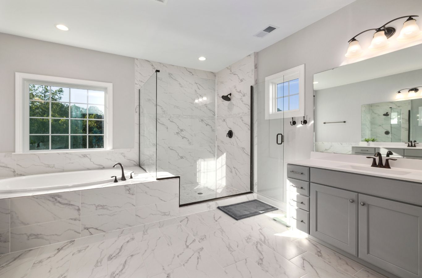 A PMB Property Improvements team member expertly remodeling a bathroom in Seminole, FL, utilizing advanced tools for superior results.