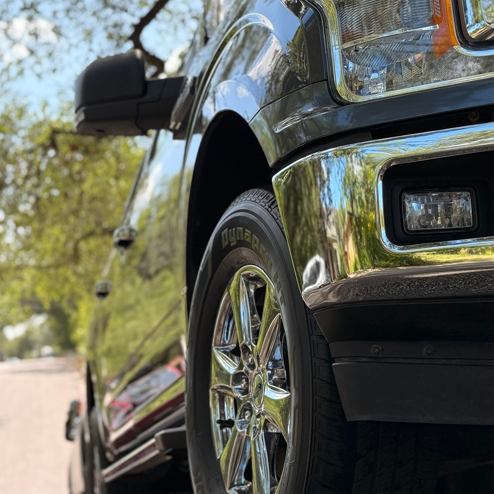 image of mechanics at work on a car