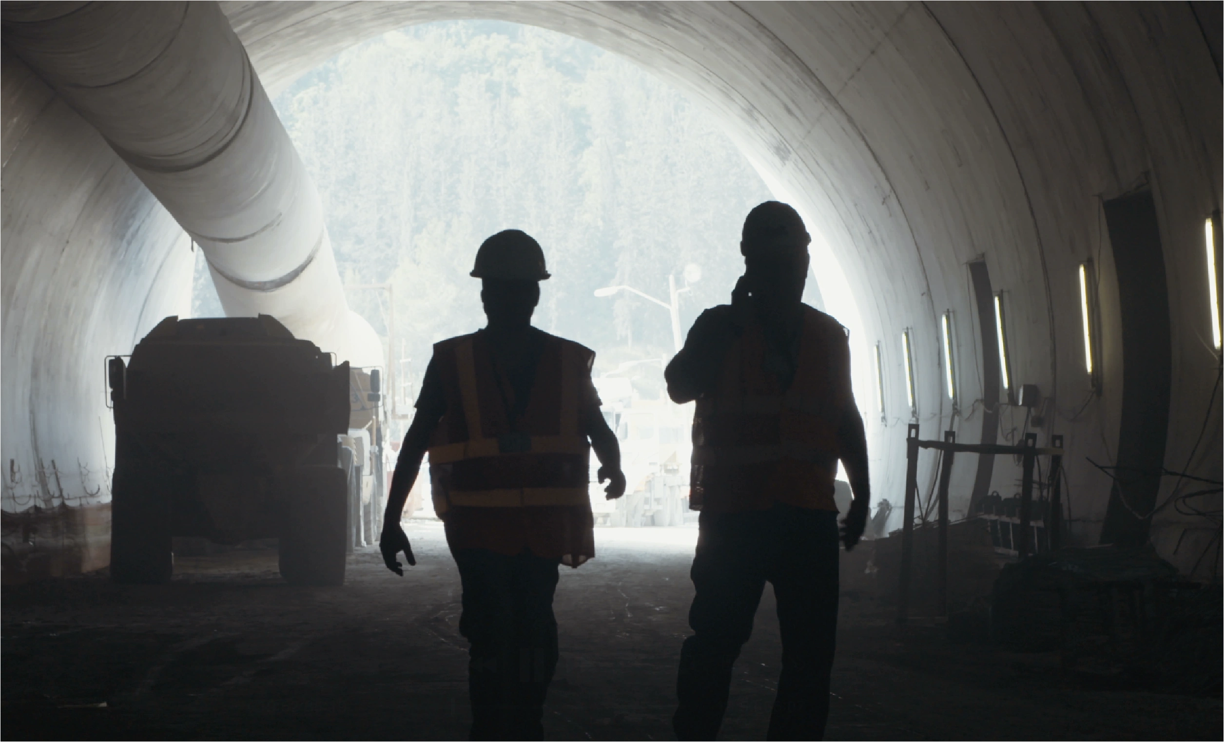 Workers in construction tunnel