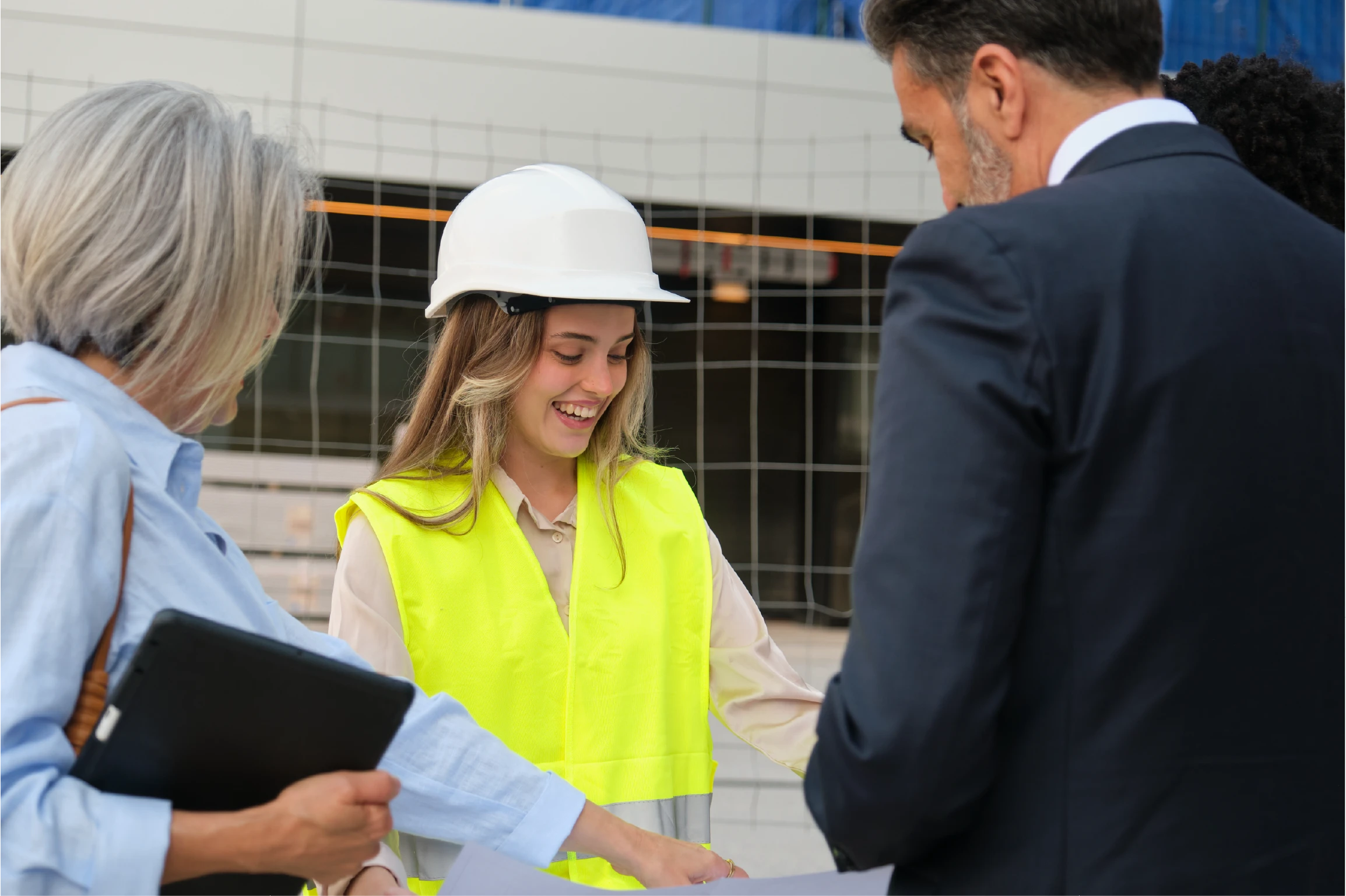 young architect speaking with consultants