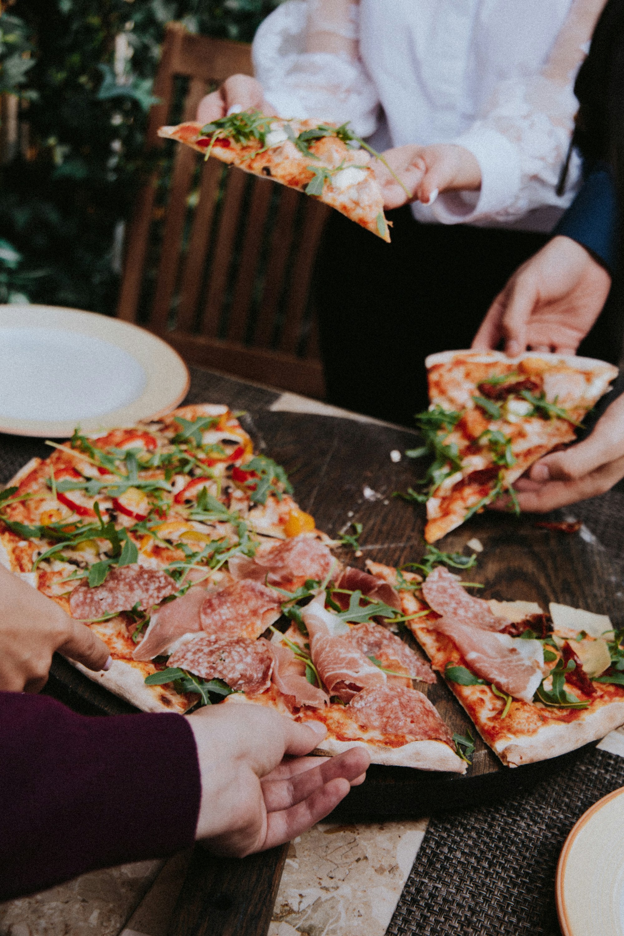 Pizza concept shot — pizza hand